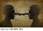 Dishonest partnership or clandestine relationship as two corrupt fraudulent people meeting together in a secret agreement as a business metaphor for corrupt agreements or corruption in business. Стоковое фото, агентство Ingram Publishing / Фотобанк Лори