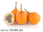 Passion fruit maracuja granadilla on white background. Стоковое фото, агентство Ingram Publishing / Фотобанк Лори