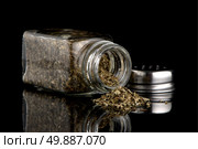 Oregano shakers on black Background. Стоковое фото, агентство Ingram Publishing / Фотобанк Лори