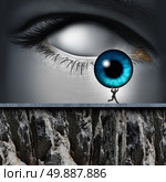 Stolen identity and having your personal information illegaly removed by a cyber thief as an internet criminal stealing the iris of a human eye as a security technology icon. Стоковое фото, агентство Ingram Publishing / Фотобанк Лори