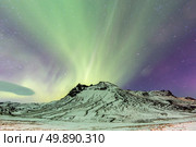 Northern Lights Aurora borealis at Vik Iceland. Стоковое фото, агентство Ingram Publishing / Фотобанк Лори