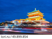 Xian bell tower (chonglou) in Xian ancient city of China at dusk. Стоковое фото, агентство Ingram Publishing / Фотобанк Лори