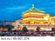 Xian bell tower (chonglou) in Xian ancient city of China at dusk. Стоковое фото, агентство Ingram Publishing / Фотобанк Лори