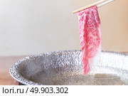 Beef Wagyu A5 Shabu shabu with steam, Groumet Japanese hot pot cuisine. Стоковое фото, агентство Ingram Publishing / Фотобанк Лори