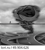 Overcoming challenges business concept as a businessman trying to cross a path with a tornado obstacle made of roads in his way as a crisis and courage metaphor with 3D illustration elements. Стоковое фото, агентство Ingram Publishing / Фотобанк Лори