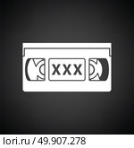 Video cassette with adult content icon. Black background with white. Vector illustration. Стоковая иллюстрация, агентство Ingram Publishing / Фотобанк Лори