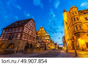 Rothenburg City hall of historic town at Rothenburg ob der Tauber, Franconia, Bavaria, Germany sunset. Стоковое фото, агентство Ingram Publishing / Фотобанк Лори
