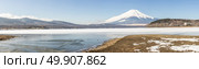 Winter Mount Fuji at Iced Yamanaka Lake in snow winter season Japan Panoramic. Стоковое фото, агентство Ingram Publishing / Фотобанк Лори