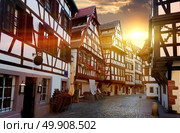 Street with historical half-timbered houses in Petite France district in Strasbourg, France. Стоковое фото, агентство Ingram Publishing / Фотобанк Лори