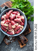 raw chicken hearts. Стоковое фото, агентство Ingram Publishing / Фотобанк Лори