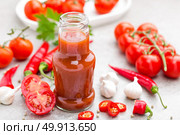 Tomato ketchup, chilli sauce, tomatos puree with chili pepper, tomatoes and garlic. Стоковое фото, агентство Ingram Publishing / Фотобанк Лори