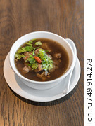 Bak kut teh Thai chinese traditional style soup with pork spare rib. Bak kut teh. Стоковое фото, агентство Ingram Publishing / Фотобанк Лори