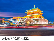 Xian bell tower (chonglou) in Xian ancient city of China at dusk. Стоковое фото, агентство Ingram Publishing / Фотобанк Лори