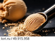 Creamy Coffee Ice Cream Served With a Scoop and Crumbles in an Elegant Setting. Стоковое AI-изображение, AI-художник Юлия Гапеенко / Фотобанк Лори