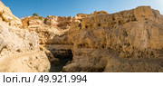 A pool of natural sea water between sandstone cliffs at Algar Seco. Carvoeiro Algarve Portugal. Стоковое фото, агентство Ingram Publishing / Фотобанк Лори