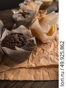 Homemade muffins with chocolate and baking ingredients. Стоковое фото, агентство Ingram Publishing / Фотобанк Лори