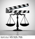 Entertainment law and media justice or TV and movie contract negotiation as a film industry slateboard or film slate shaped as a justice scale as a 3D render. Стоковое фото, агентство Ingram Publishing / Фотобанк Лори