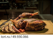 Carving of Roasted lamb meat. Стоковое фото, агентство Ingram Publishing / Фотобанк Лори