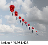 Business decline concept as a group of business people holding gradual decreasing air balloons as a financial decrease metaphor with 3D illustration elements. Стоковое фото, агентство Ingram Publishing / Фотобанк Лори
