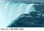 Niagara falls close up of the horseshoe waterfall in Ontario Canada as a natural wonder tourist attraction. Стоковое фото, агентство Ingram Publishing / Фотобанк Лори