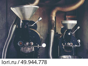 roasted coffee machine for Coffee beans roasting process. Стоковое фото, агентство Ingram Publishing / Фотобанк Лори