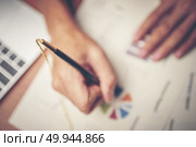 Business hands pointing and signing terms and agreement papers contract, signing concept. Стоковое фото, агентство Ingram Publishing / Фотобанк Лори