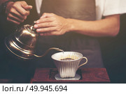 coffee dripping process, vintage filter image. Стоковое фото, агентство Ingram Publishing / Фотобанк Лори