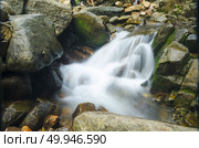 Pliu waterfall in Pliu National Rain forest park, Thailand. Стоковое фото, агентство Ingram Publishing / Фотобанк Лори