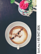 Top view cup of cappuccino on wooden table background. . Стоковое фото, агентство Ingram Publishing / Фотобанк Лори