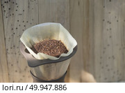 Hand drip coffee set, metal drip glass pitcher in vintage tone. Стоковое фото, агентство Ingram Publishing / Фотобанк Лори