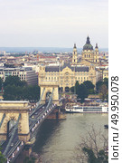 Budapest, Hungary - June 2018, The Hungarian Parliament Building. Budapest, Hungary - June 2018, The Hungarian Parliament Building, the Orszaghaz, and the River Danube in Budapest, Hungary, 29 June 2018. Budapest, Hungary - June 2018, The Hungarian Parliament Building, the Orszaghaz, and the River Danube in Budapest, Hungary, 29 June 2018. Стоковое фото, агентство Ingram Publishing / Фотобанк Лори