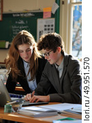 Two students, a boy wearing glasses and a girl with long hair, are focused on their schoolwork, sharing notes and discussing academic content. Стоковое AI-изображение, AI-художник Данила Большаков / Фотобанк Лори