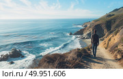 A man is walking on a path close to the ocean. Стоковое AI-изображение, AI-художник Данила Большаков / Фотобанк Лори