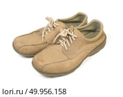 Brown man’s shoes isolated on white background. Стоковое фото, агентство Ingram Publishing / Фотобанк Лори