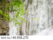 Deep forest Waterfall in Kanchanaburi, Thailand. Стоковое фото, агентство Ingram Publishing / Фотобанк Лори