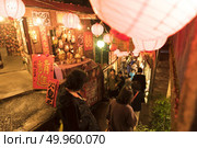 Taipei, Taiwan - 2016: Jiufen is Taiwan’s most famous tourist attraction outside of greater Taipei but within easy reach for a day or overnight trip. Стоковое фото, агентство Ingram Publishing / Фотобанк Лори