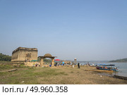 Sangklaburi,Thailand-May 23,2016 : Interior Wall Decoration of Wat Saam Prasob, the last remaining vestige of the old town flooded of Khao Laem Reservoir, in Sangklaburi, Thailand. Редакционное фото, агентство Ingram Publishing / Фотобанк Лори