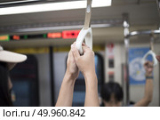 Handle bars in train. Стоковое фото, агентство Ingram Publishing / Фотобанк Лори