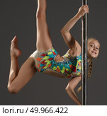 Little girl on pylon studio shot. Стоковое фото, фотограф Гурьянов Андрей / Фотобанк Лори