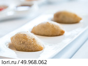 Chinese dim sum deep Fried BBQ Pork dumplings - Chinese groumet cuisine. Стоковое фото, агентство Ingram Publishing / Фотобанк Лори