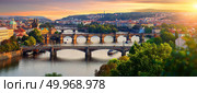 Overview of old Prague with Charles bridge at sunset. Стоковое фото, агентство Ingram Publishing / Фотобанк Лори