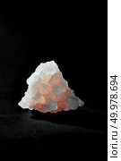 Sea salt of crystal isolated on a black background with place for text. Crystal of himalayan salt on a black background. Стоковое фото, агентство Ingram Publishing / Фотобанк Лори