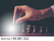 Businessman play with chess game. concept of business strategy and tactic. Стоковое фото, агентство Ingram Publishing / Фотобанк Лори