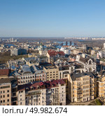 Cityscape view on the modern buildings in the city center, St. Andrew’s Church, Podolsky Bridge and the left coast of the city Kiev, Ukraine. Drone photo. bird’s-eye view on the modern buildings in the city Kiev Ukraine. Стоковое фото, агентство Ingram Publishing / Фотобанк Лори