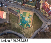 view from above of the ancient street Andrew’s Descent and the St. Andrew’s Church in Kiev city, Ukraine. Drone photo. view from above of cathedral of St. Andrey Andreeivskaya church in Kyiv city, Ukraine. Стоковое фото, агентство Ingram Publishing / Фотобанк Лори