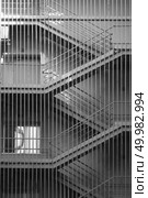 gray metal staircase in the building. gray metal staircase. Стоковое фото, агентство Ingram Publishing / Фотобанк Лори