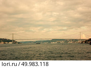 Beautiful view of the Bosphorus, the Bosphorus Bridge which connects Asian and European sides of Istanbul. Bosphorus bridge in Istanbul Turkey - connecting Asia and Europe. Bosphorus, Rumelian Castle and Fatih Sultan Mehmet Bridge view from, Anatolian side of the Bosporus. Стоковое фото, агентство Ingram Publishing / Фотобанк Лори