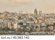 The Galata Tower, the city of Istanbul and the embankment with the passenger ships. Turkey. Aerial view the city of Istanbul. Стоковое фото, агентство Ingram Publishing / Фотобанк Лори