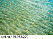 Patterns of movement of water in the pool.. Shining blue water ripple background. Стоковое фото, агентство Ingram Publishing / Фотобанк Лори