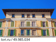 Old colorful houses in center of spanish town Palma de Mallorca, Spain. Beautiful three storey ancient building. Spain.. View on Palma de Mallorca. Стоковое фото, агентство Ingram Publishing / Фотобанк Лори